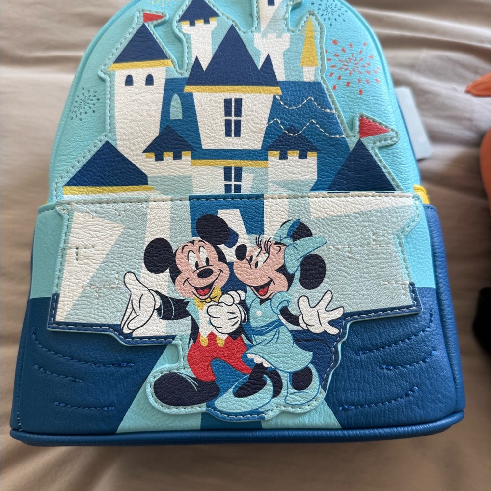 Loungefly Disneyland 65th anniversary backpack NWT